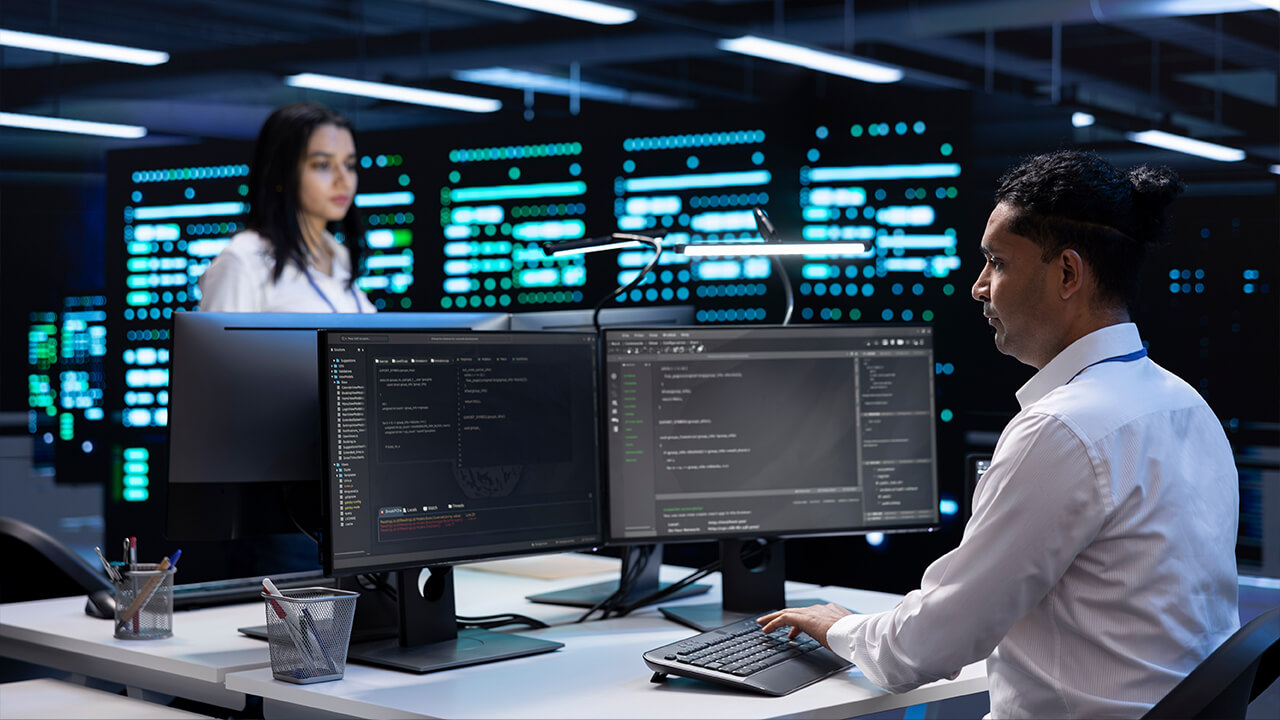 Team working with computers in a technology workspace